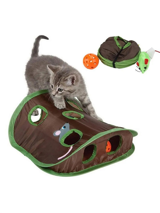 Grey tabby kitten playing with a brown and green hide-and-seek cat toy with multiple holes and a mouse graphic. - Image 15