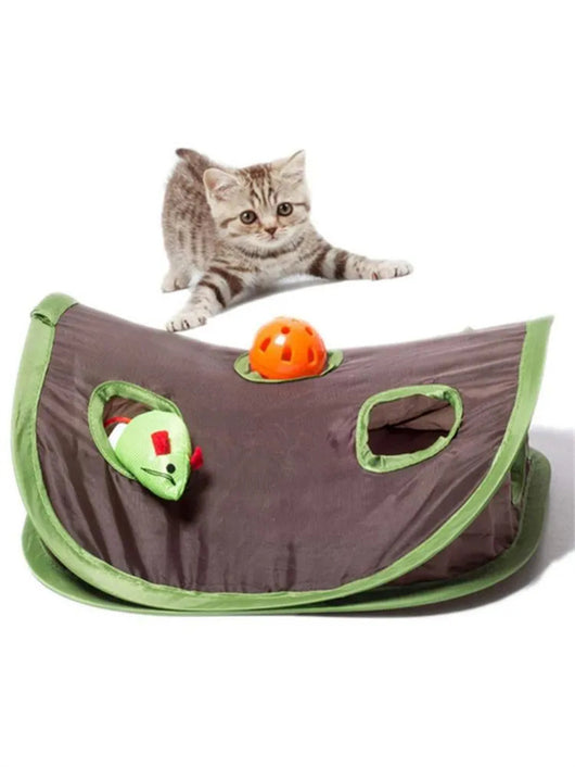 Grey tabby kitten playing with a brown and green hide-and-seek cat toy with multiple holes and a mouse graphic. - Image 16