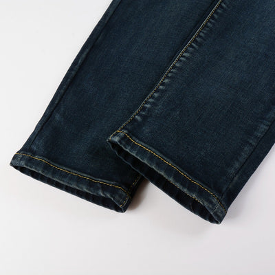 Jeans Azules Rotos con Parches de Cuero - Estilo Urbano de Alta Moda - Image 12