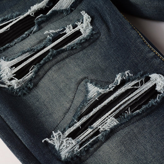 Jeans Azules Rotos con Parches de Cuero - Estilo Urbano de Alta Moda - Image 17