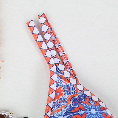 Retro 4-color printed women's bikini with red, blue, and white paisley pattern, featuring a triangle top and high-cut bottom. - Image 43