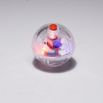 Luminous transparent plastic cat ball mouse toy with flashing multi-color LED lights, shown on a plush dog. - Image 8