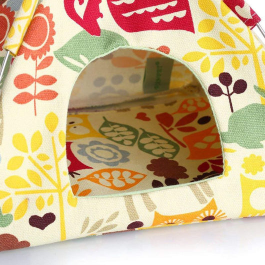Colorful canvas bird tent with an owl and leaf pattern, featuring a metal frame and hanging hook, next to a cockatiel. - Image 13
