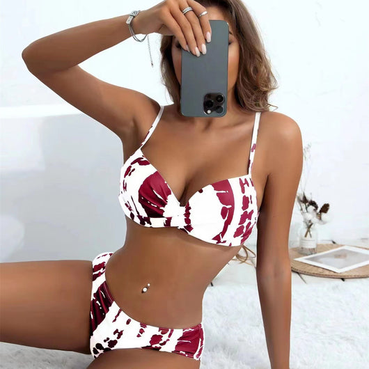 Women's two-piece bikini with a white and dark red abstract pattern. Features a push-up top and classic brief bottoms. - Image 16