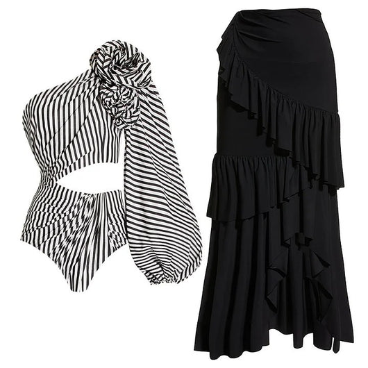 Black and white striped one-piece swimsuit with one-shoulder design, floral appliqué, balloon sleeve, and waist cut-outs. - Image 25