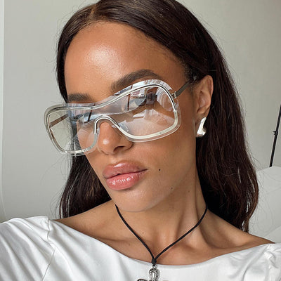 Women's fashionable shield sunglasses with a gold metal frame and dark gray lenses, featuring a unique wavy design. - Image 20