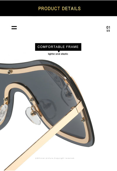 Women's fashionable shield sunglasses with a gold metal frame and dark gray lenses, featuring a unique wavy design. - Image 23