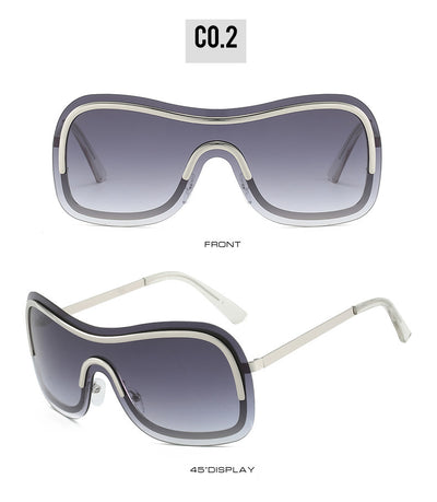 Women's fashionable shield sunglasses with a gold metal frame and dark gray lenses, featuring a unique wavy design. - Image 26