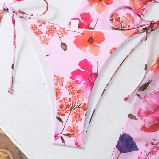 Milky white floral print three-piece swimsuit with triangle bikini top, v-cut bottom, and sheer long-sleeve cover-up. - Image 80