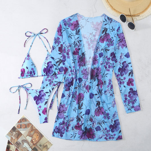 Milky white floral print three-piece swimsuit with triangle bikini top, v-cut bottom, and sheer long-sleeve cover-up. - Image 87