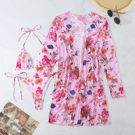 Milky white floral print three-piece swimsuit with triangle bikini top, v-cut bottom, and sheer long-sleeve cover-up. - Image 89
