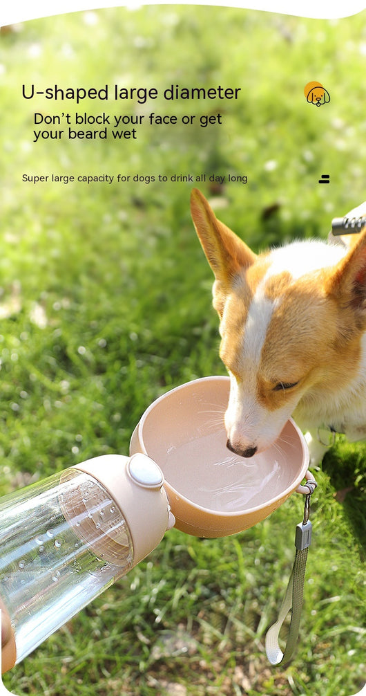 Yellow portable pet water bottle with clear reservoir, built-in drinking bowl, and wrist strap, 28cm tall. - Image 27