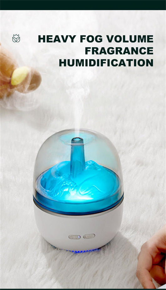 White essential oil diffuser and humidifier with a clear dome top, glowing red inside, and blue LED base light. - Image 12