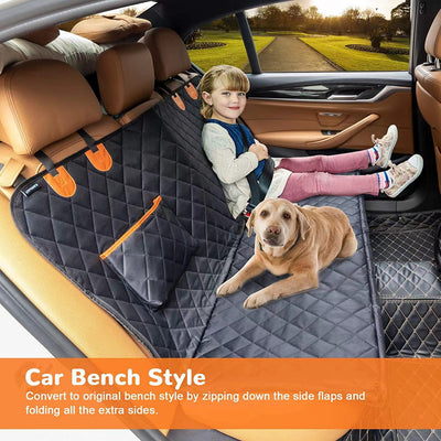 Black quilted pet car seat cover with adjustable straps and side flaps, shown with water droplets on the fabric. - Image 20