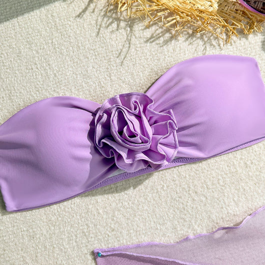 Women's blue tube top swimsuit with a large 3D flower, tie-side bikini bottoms, and a sheer sarong skirt. - Image 14