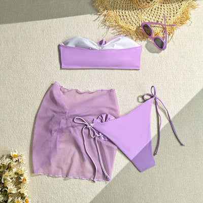 Women's blue tube top swimsuit with a large 3D flower, tie-side bikini bottoms, and a sheer sarong skirt. - Image 17