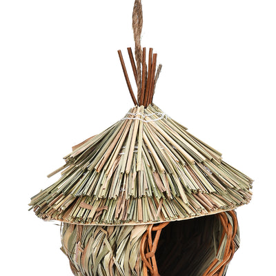 Handmade hanging bird nest crafted from natural grass and wicker, featuring a thatched roof and a round entrance. - Image 14