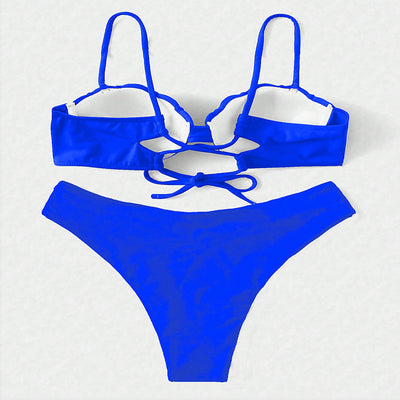 Vibrant blue two-piece bikini with seashell-shaped top and high-cut bottoms, perfect for beach or pool. - Image 20