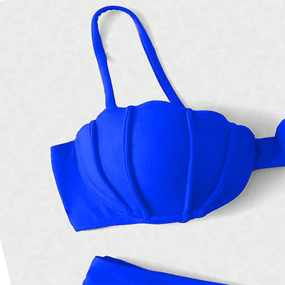 Vibrant blue two-piece bikini with seashell-shaped top and high-cut bottoms, perfect for beach or pool. - Image 23