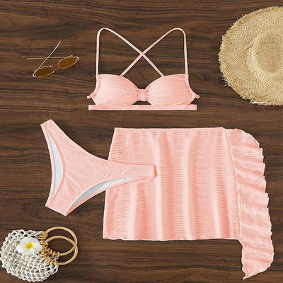 Hot pink lace-up bikini three-piece swimsuit with textured fabric and ruffled sheer cover-up skirt. - Image 12