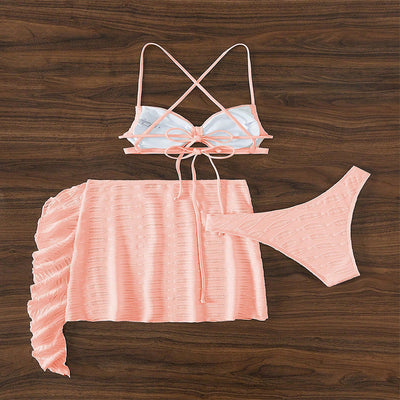 Hot pink lace-up bikini three-piece swimsuit with textured fabric and ruffled sheer cover-up skirt. - Image 15