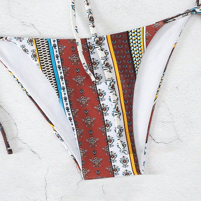 Women's printed lace-up bandeau bikini top and tie-side bottoms with colorful striped and paisley patterns. - Image 10