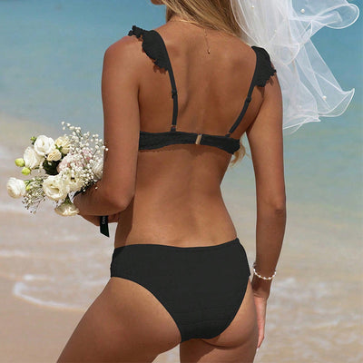 Green ruffled bikini with textured fabric and triangle top, modeled on a sunny beach. - Image 34