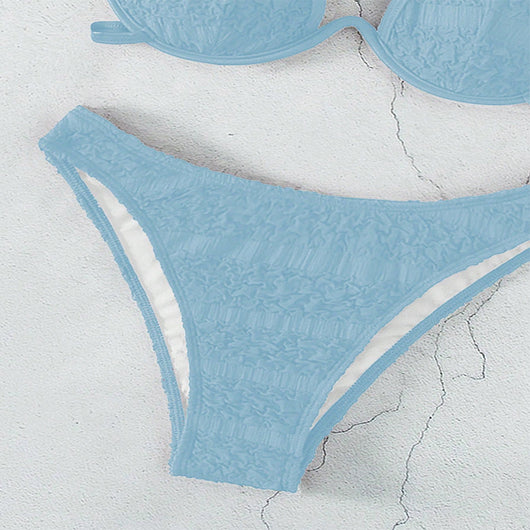 Woman in a white halter lace-up bikini with textured fabric, U-wire top, and high-cut bottom by a pool. - Image 13