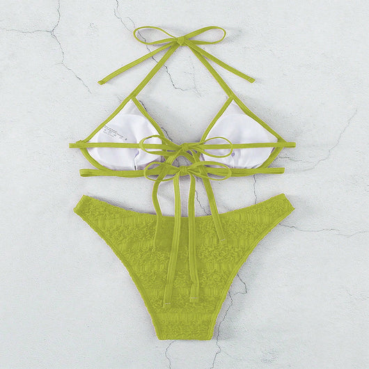Woman in a white halter lace-up bikini with textured fabric, U-wire top, and high-cut bottom by a pool. - Image 23