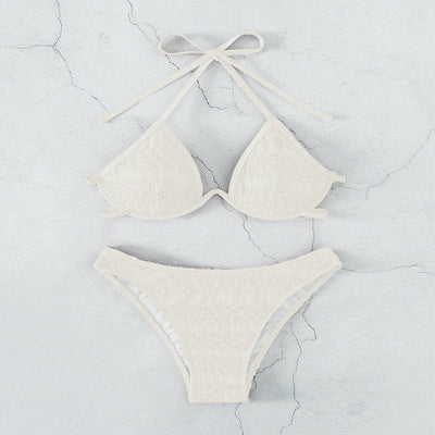 Woman in a white halter lace-up bikini with textured fabric, U-wire top, and high-cut bottom by a pool. - Image 24