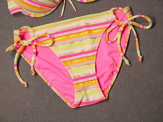 Colorful striped lace-up bikini swimsuit with a ruffled halter top and matching tie-side bottoms. - Image 10