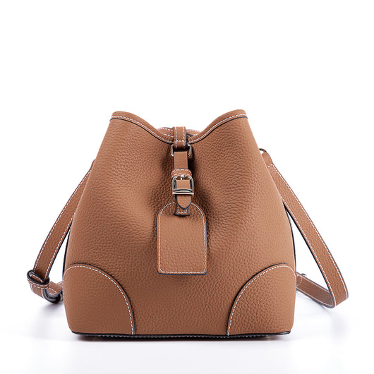 Bolso Cubo Retro de Cuero Genuino con Patrón Grabado y Cordón Ajustable - Image 30