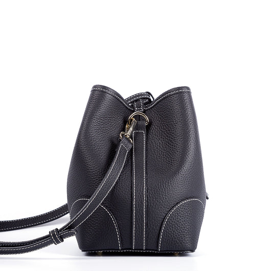 Bolso Cubo Retro de Cuero Genuino con Patrón Grabado y Cordón Ajustable - Image 38