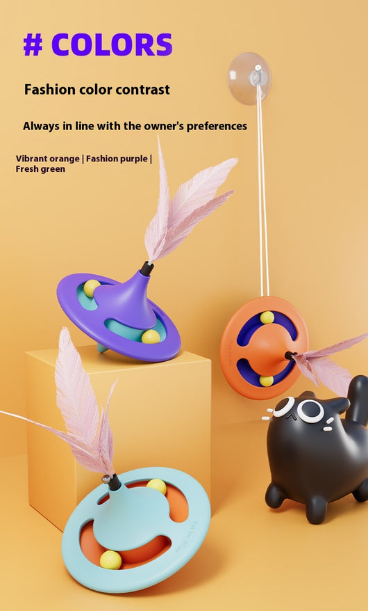 Orange and blue cat turntable toy with purple feathers, hanging from a clear suction cup on a white background. - Image 9