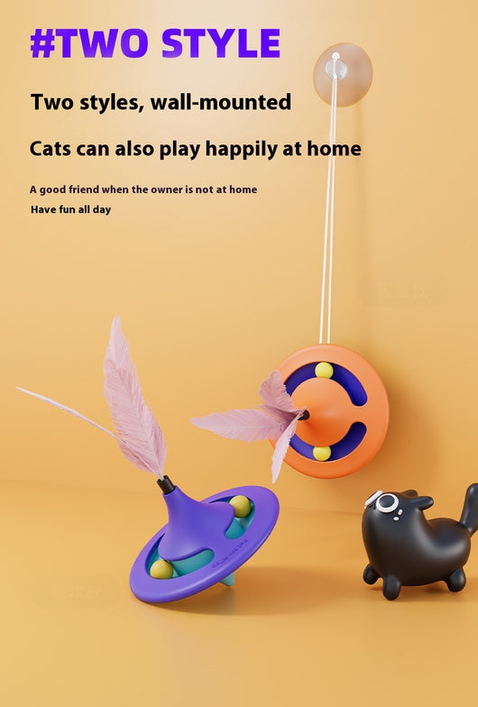 Orange and blue cat turntable toy with purple feathers, hanging from a clear suction cup on a white background. - Image 13