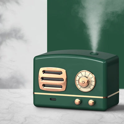 White retro humidifier with rose gold accents, designed like a vintage radio, emitting a fine mist. - Image 14