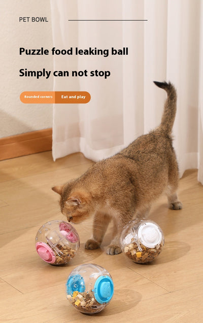 Clear plastic pet tumbler food leakage toy with blue accents and a cat face design, on a wooden floor. - Image 9