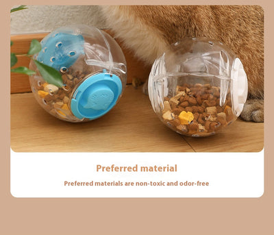 Clear plastic pet tumbler food leakage toy with blue accents and a cat face design, on a wooden floor. - Image 12