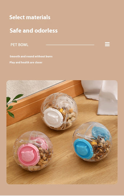 Clear plastic pet tumbler food leakage toy with blue accents and a cat face design, on a wooden floor. - Image 17