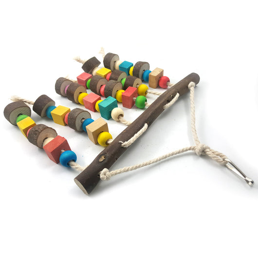 Colorful wooden parrot bite toy with a natural branch hanger and multiple strings of beads and blocks. - Image 17