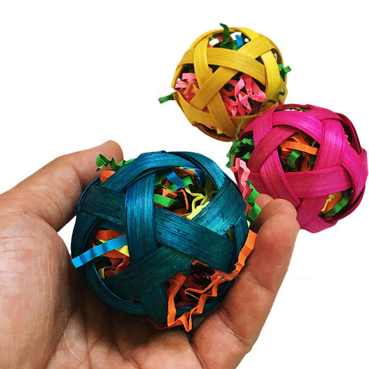 Three colorful woven bamboo toy balls, filled with shredded paper, for small pets to chew and forage. - Image 11