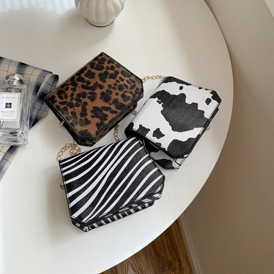 Bolso Bandolera para Labiales Estilo Coreano con Cadena y Estampado Vaca - Image 11