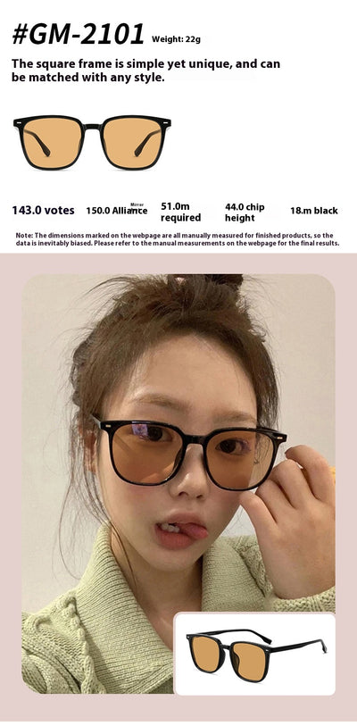 Black full-frame sunglasses with brown lenses, featuring a boxy style and visible dimensions. - Image 23