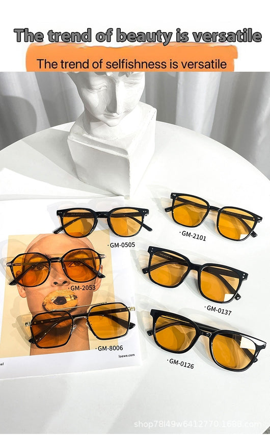 Black full-frame sunglasses with brown lenses, featuring a boxy style and visible dimensions. - Image 24