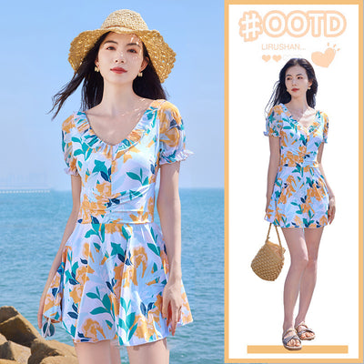 White floral high waist swimsuit dress with orange, teal, and navy flowers, ruffled scoop neck, and puff sleeves. - Image 13
