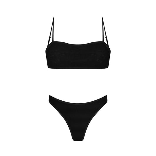 Woman in a blue banded bikini with a circular pattern standing on a sandy beach with clear water and green hills. - Image 34