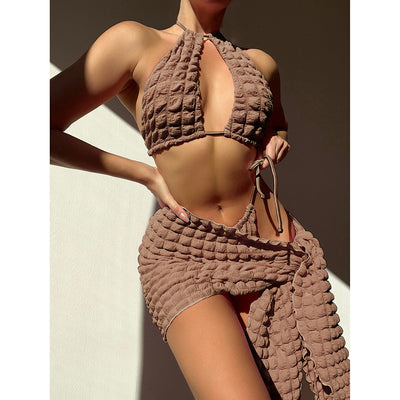 Light brown seersucker three-piece bikini swimsuit with a lace-up triangle top, tie-side bottoms, and a matching wrap skirt. - Image 8