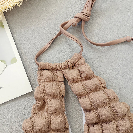 Light brown seersucker three-piece bikini swimsuit with a lace-up triangle top, tie-side bottoms, and a matching wrap skirt. - Image 11
