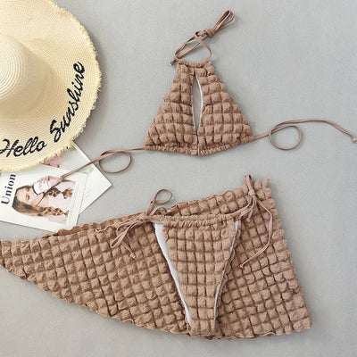 Light brown seersucker three-piece bikini swimsuit with a lace-up triangle top, tie-side bottoms, and a matching wrap skirt. - Image 12