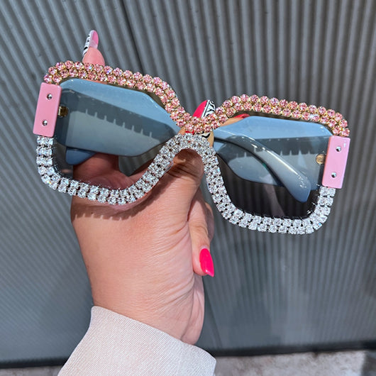 Oversized rectangular sunglasses with black lenses and frames heavily embellished with multiple rows of sparkling rhinestones. - Image 18
